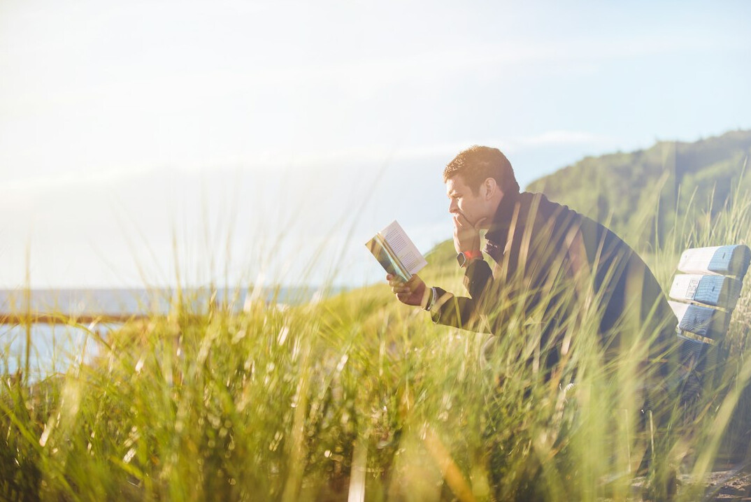 person reading mystery novel
